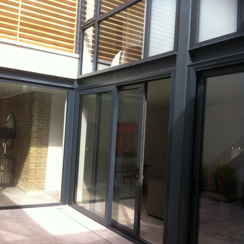 Anthracite aluminium sliding patio doors fitted in Norbury
